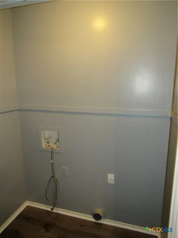 a room with a shower and a sink