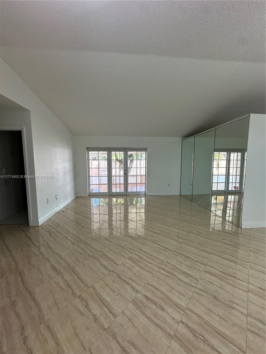 Westbrooke at Avalon Hialeah, FL 33015 - Photo 11 of 24 wooden floor in an empty room with a window