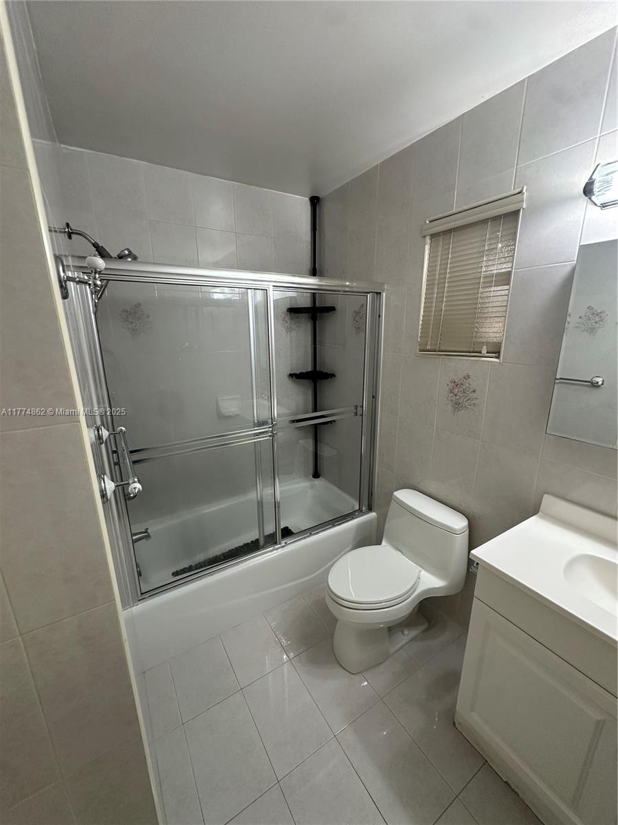 Westbrooke at Avalon Hialeah, FL 33015 - Photo 14 of 24 a bathroom with a shower and a toilet