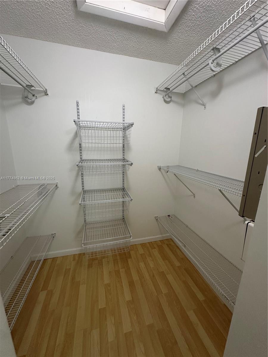 Westbrooke at Avalon Hialeah, FL 33015 - Photo 16 of 24 a view of a room with racks on the wall