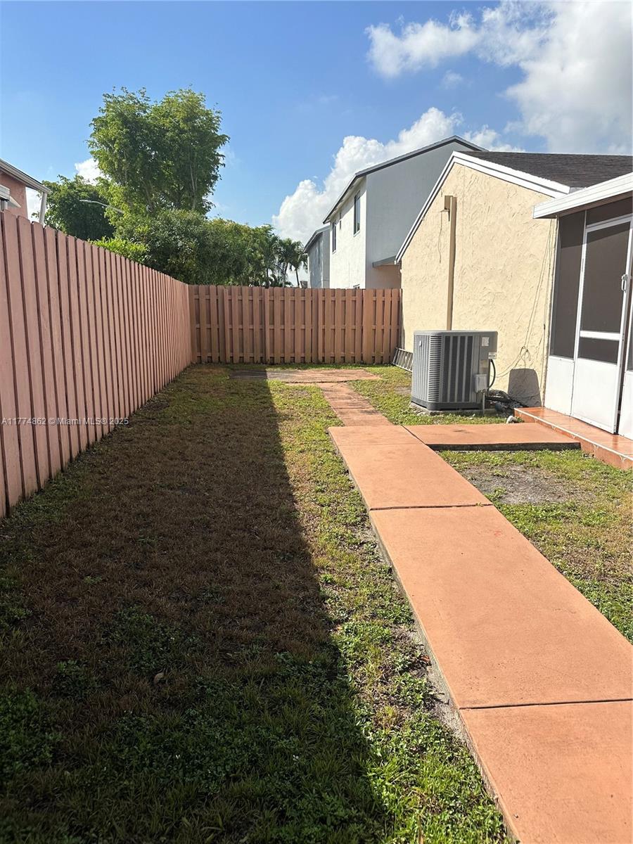Westbrooke at Avalon Hialeah, FL 33015 - Photo 21 of 24 a view of a backyard with a garden