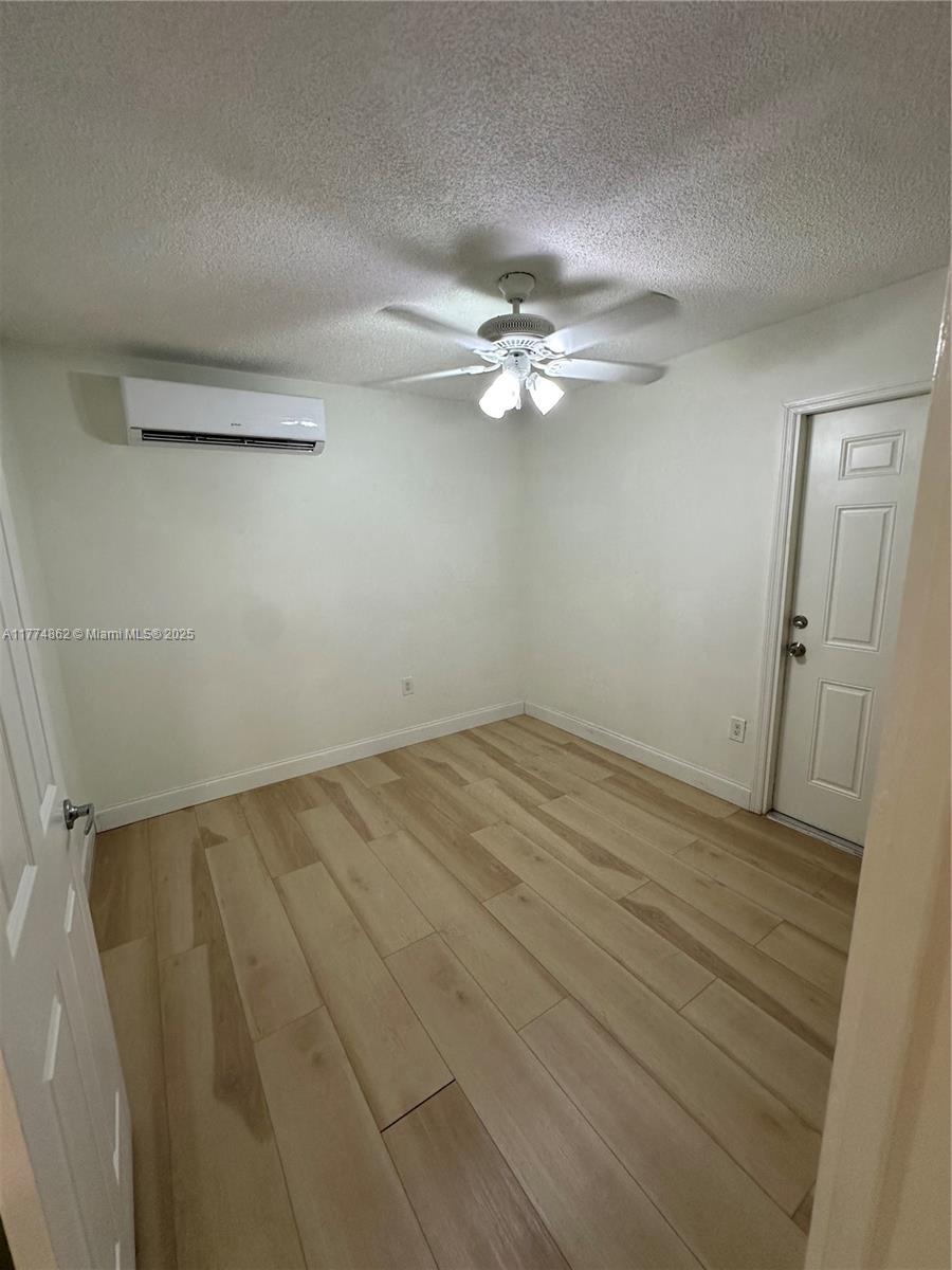 Westbrooke at Avalon Hialeah, FL 33015 - Photo 6 of 24 wooden floor in an empty room