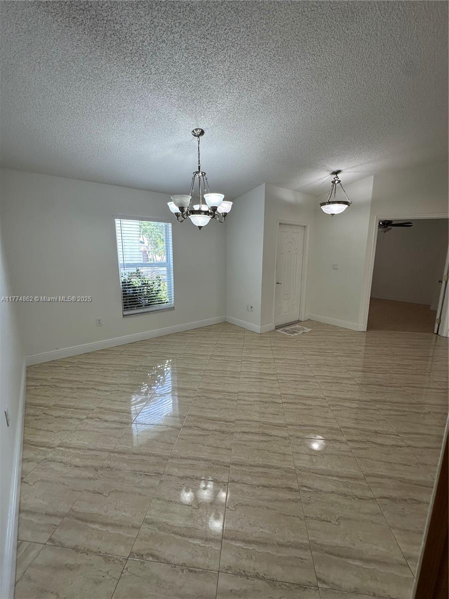 Westbrooke at Avalon Hialeah, FL 33015 - Photo 10 of 24 a view of empty room with window