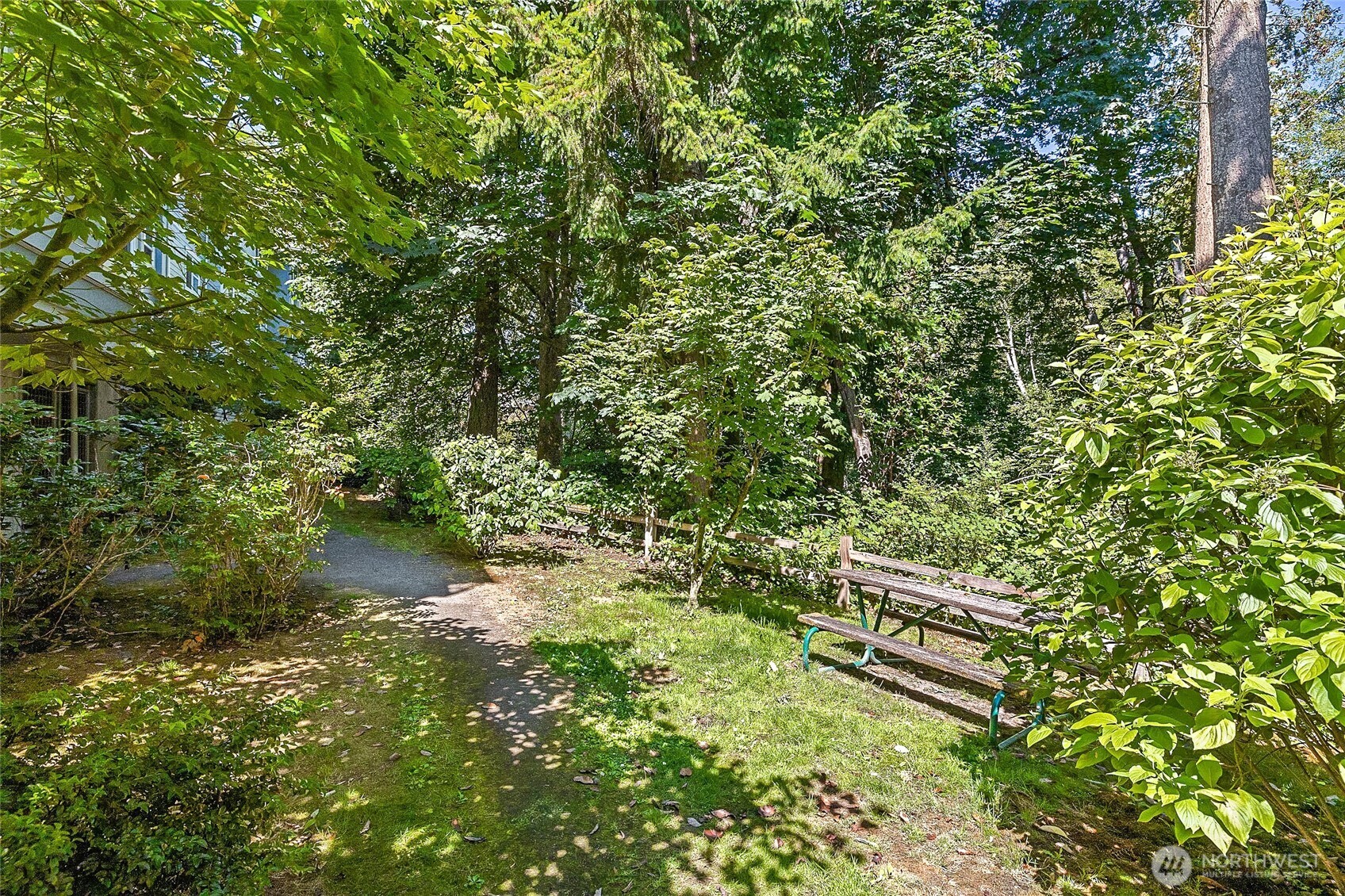 300 High School Road Northeast, Unit 403 Bainbridge Island, WA 98110 - Photo 23 of 23 a view of a yard with plants