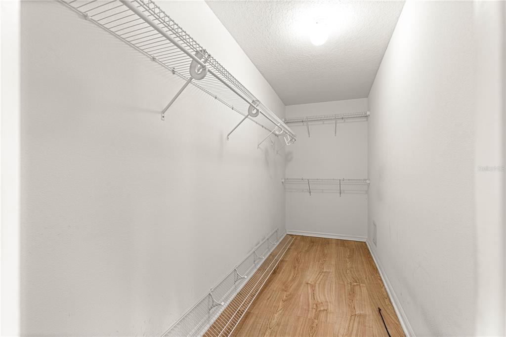 10884 Southwest 53rd Circle Ocala, FL 34476 - Photo 25 of 57 a view of a room with wooden floor