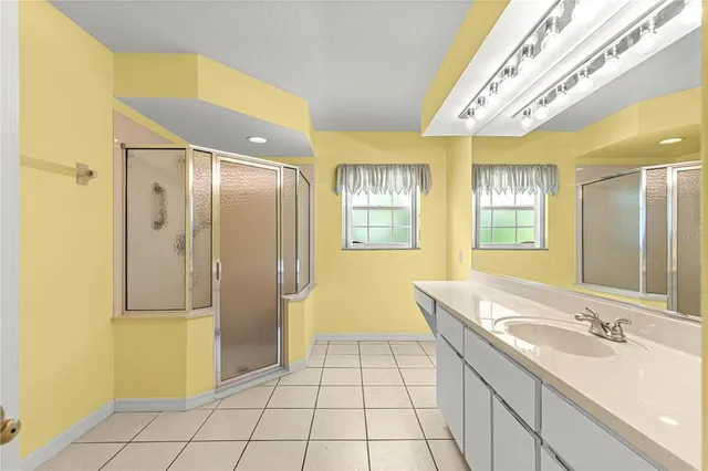 a bathroom with a shower and a toilet