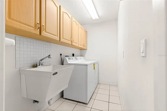 a view of an entryway with a ceiling fan