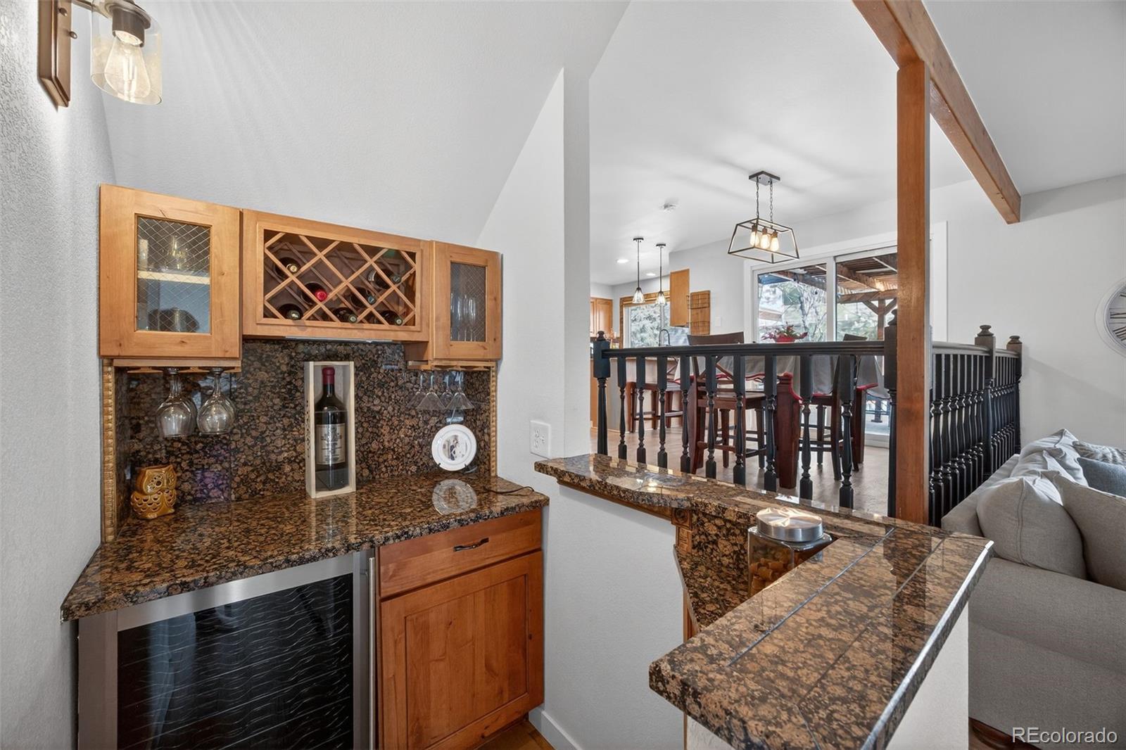 8764 Wildrose Court Highlands Ranch, CO 80126 - Photo 13 of 50 a living room with furniture
