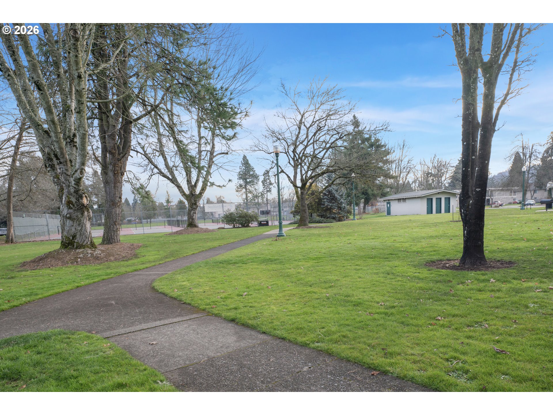 930 1st Street Springfield, OR 97477 - Photo 34 of 43 a view of a park with large trees