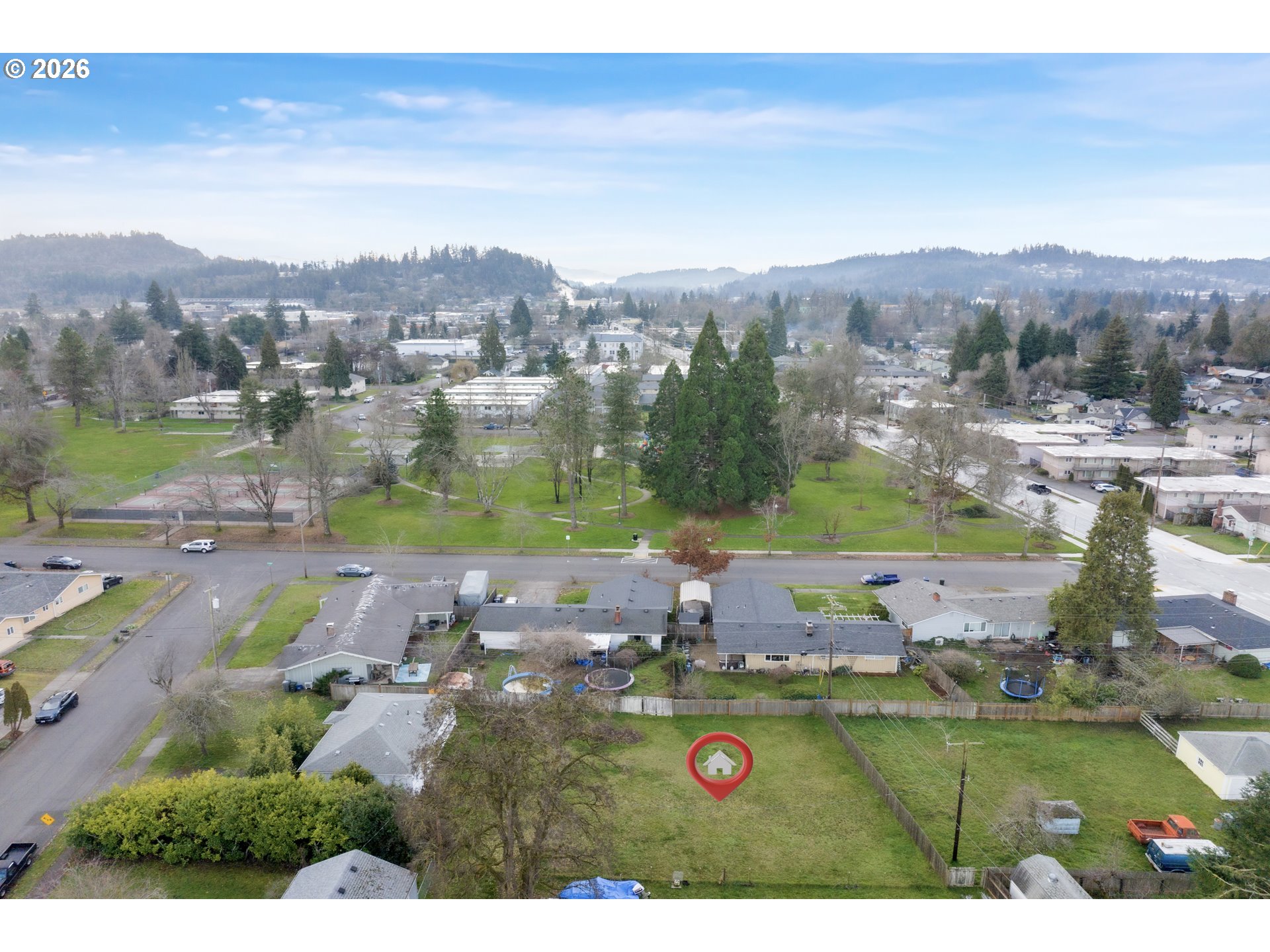 930 1st Street Springfield, OR 97477 - Photo 36 of 43 an aerial view of residential houses with outdoor space and river