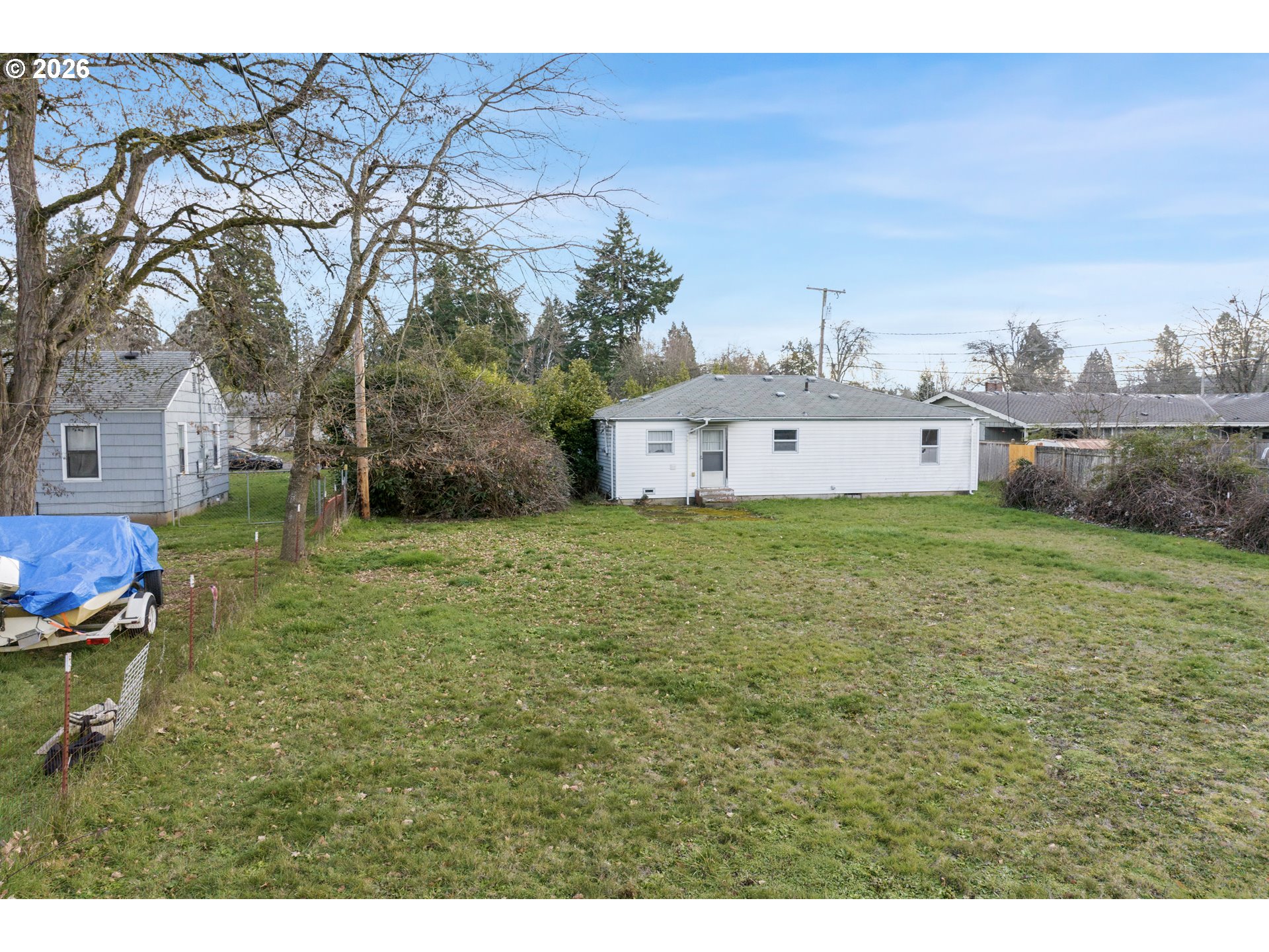 930 1st Street Springfield, OR 97477 - Photo 38 of 43 a view of a house with a yard