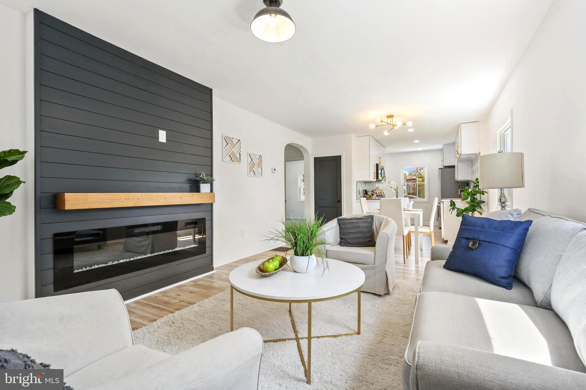 5625 Tramore Road Baltimore, MD 21214 - Photo 6 of 32 with Custom Electric Fireplace and mantel