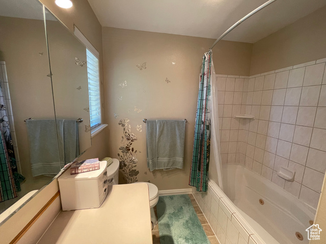 11473 South Dempsey Creek Road Lava Hot Springs, ID 83246 - Photo 19 of 47 Full bathroom with a combined bath / shower with jetted tub and tile patterned floors