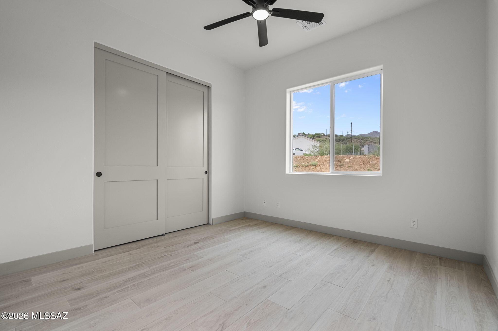1557 Pinguinos Court Rio Rico, AZ 85648 - Photo 35 of 37 35. Bedroom 2 (middle bedroom)