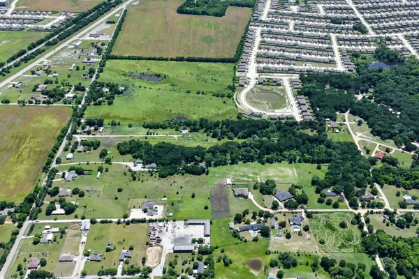 a view of a garden with a lake