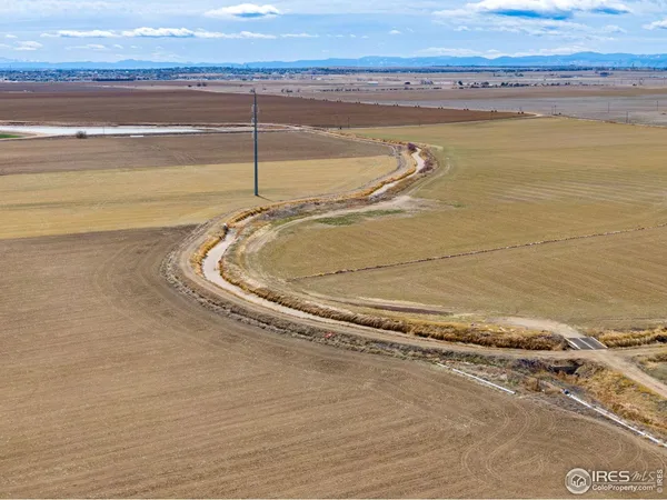 a view of an ocean and city