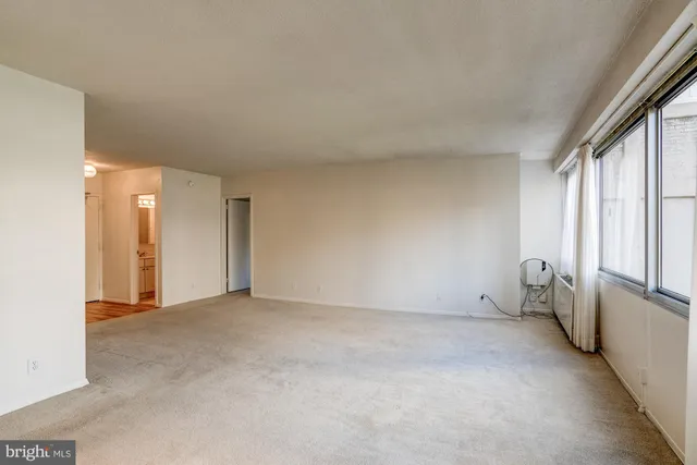 a kitchen with a stove and a microwave