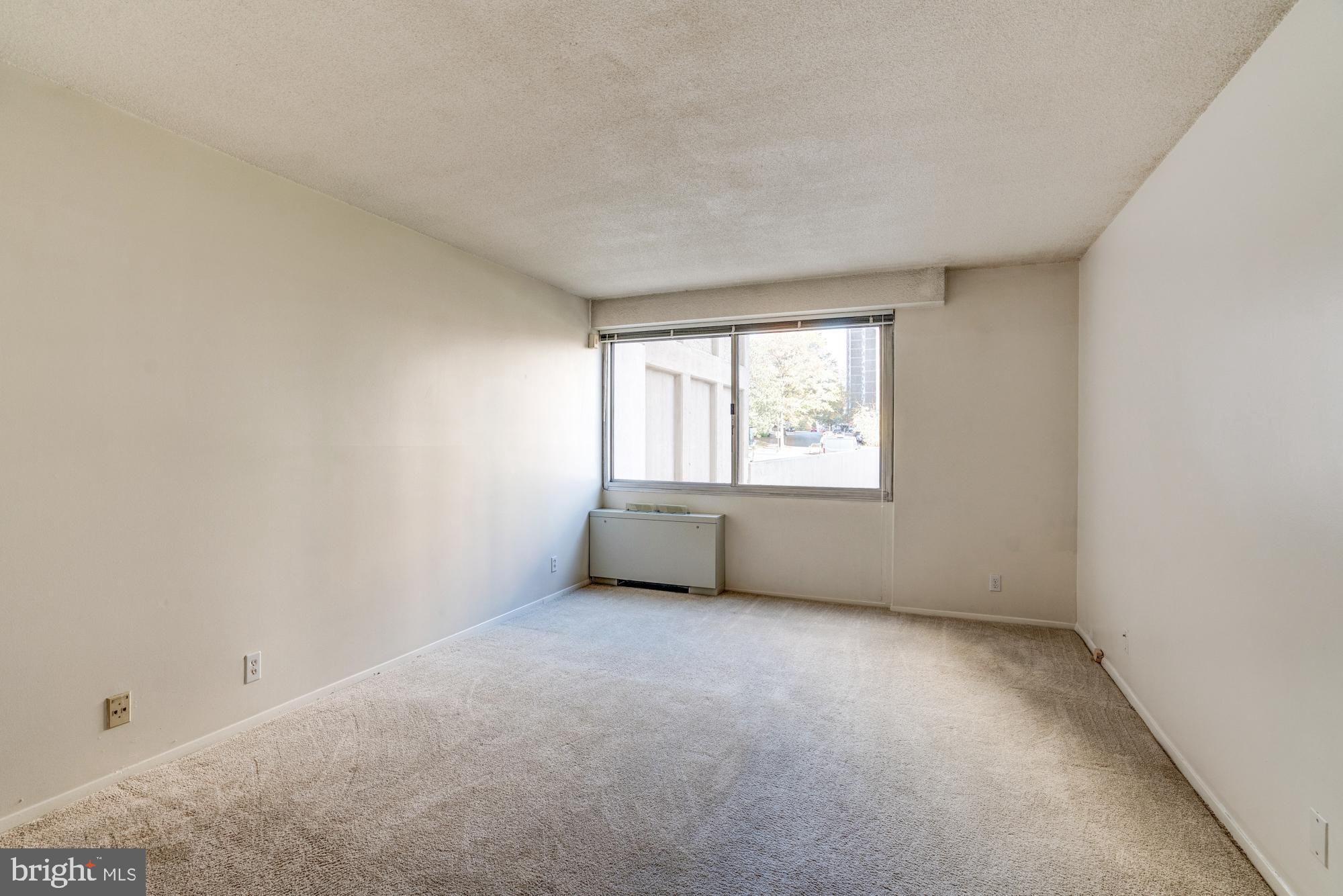 4515 Willard Avenue, Unit 719S Chevy Chase, MD 20815 - Photo 34 of 44 an empty room with a window