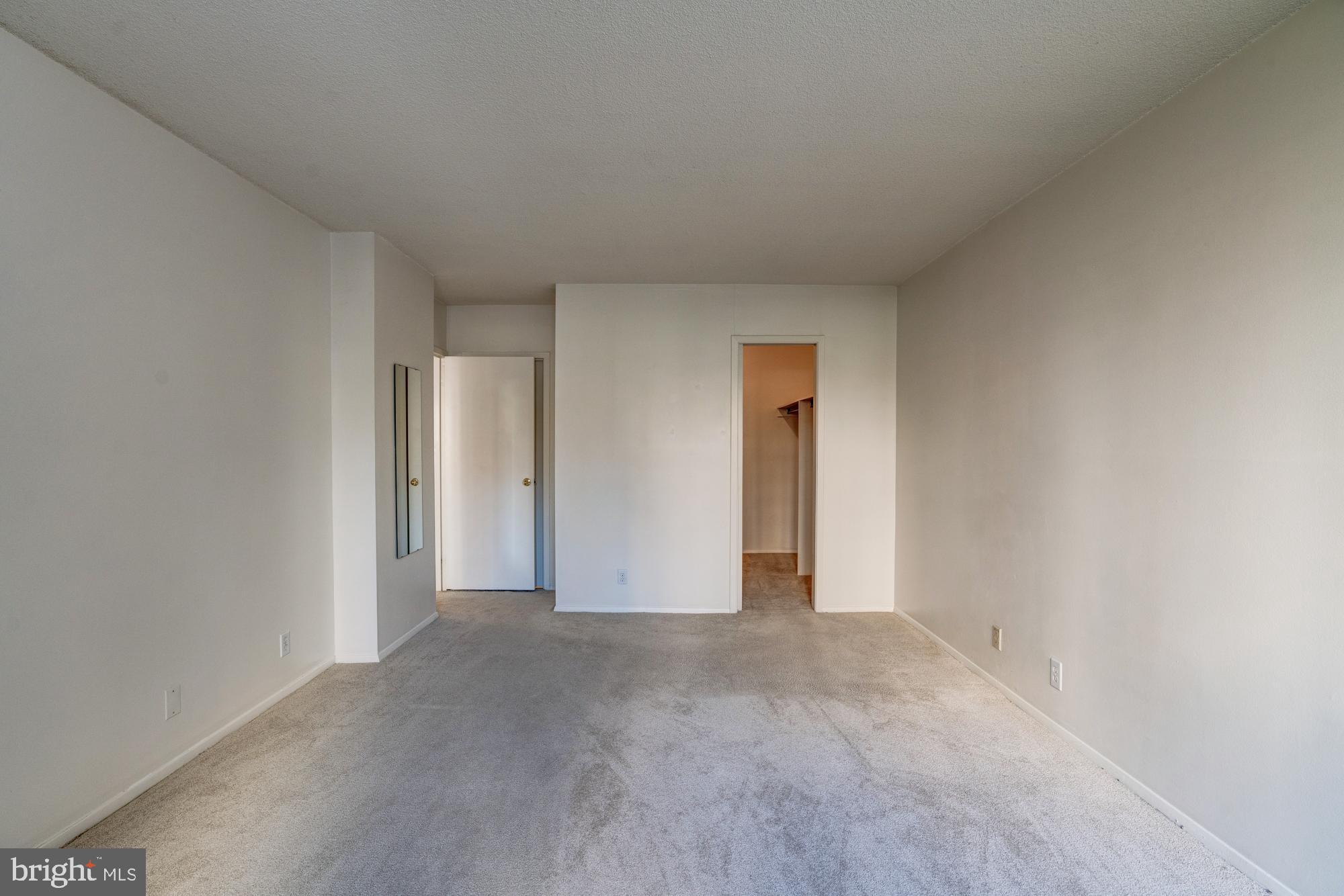 4515 Willard Avenue, Unit 719S Chevy Chase, MD 20815 - Photo 38 of 44 a view of an empty room and a window