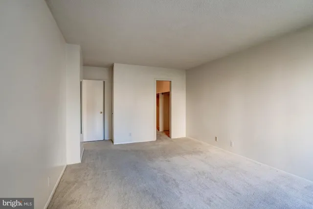a view of hallway with closet