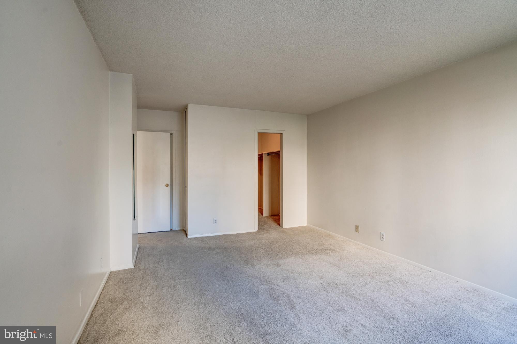4515 Willard Avenue, Unit 719S Chevy Chase, MD 20815 - Photo 39 of 44 a view of an empty room and a window