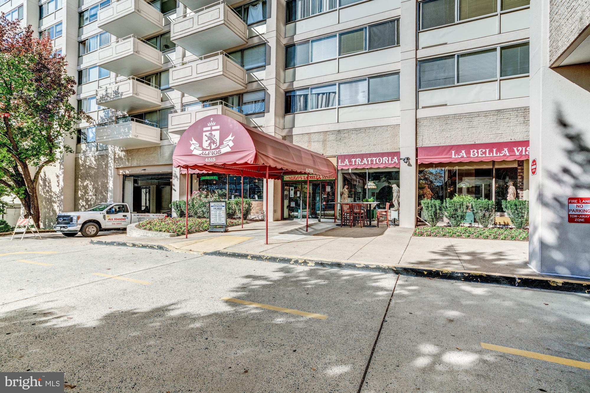 4515 Willard Avenue, Unit 719S Chevy Chase, MD 20815 - Photo 4 of 44 a front view of multi story building with retail shops