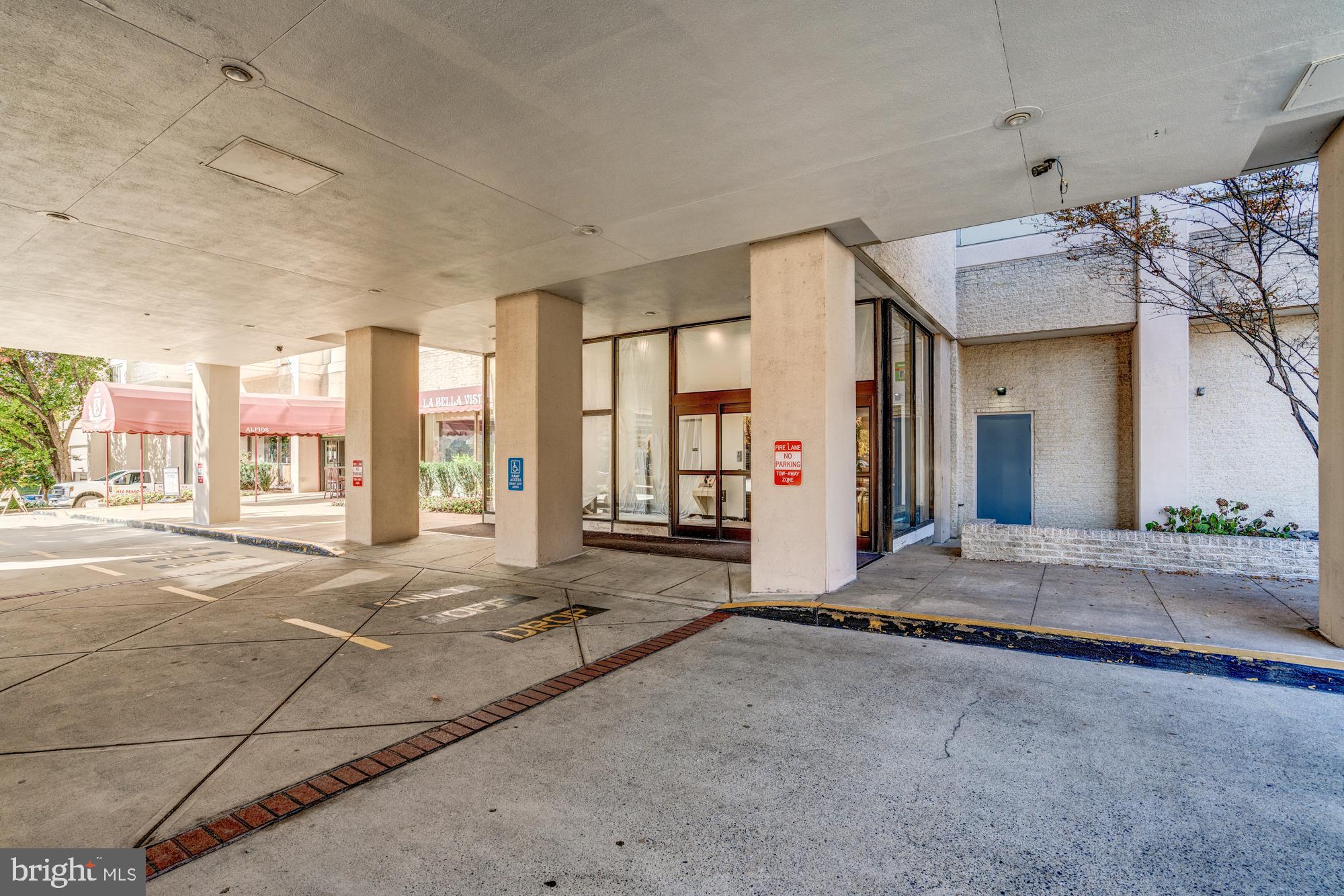4515 Willard Avenue, Unit 719S Chevy Chase, MD 20815 - Photo 8 of 44 a spacious bathroom with a granite countertop sink and a large mirror
