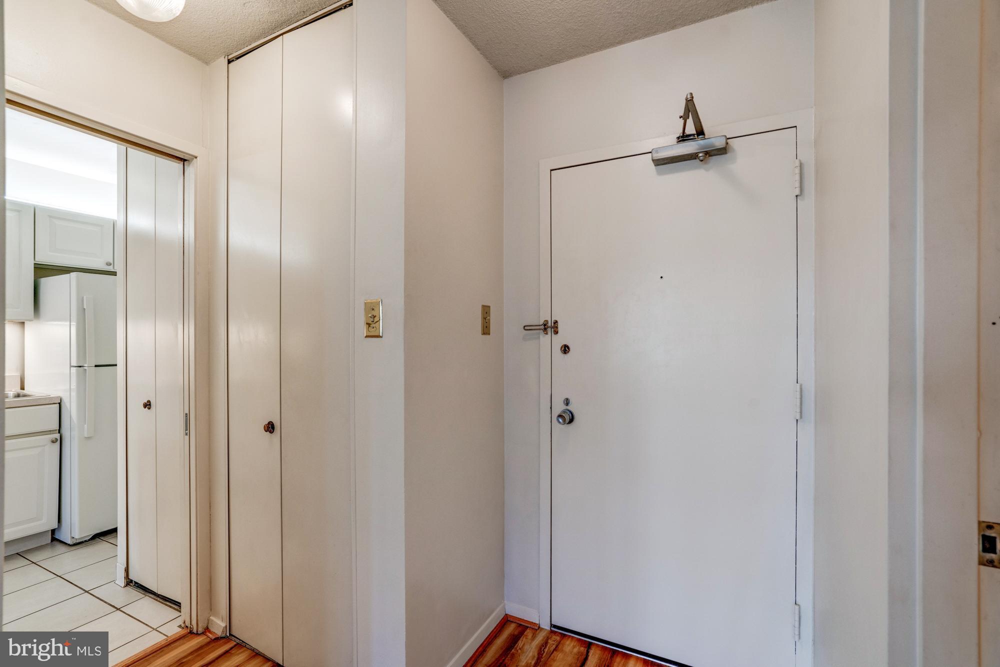 4515 Willard Avenue, Unit 719S Chevy Chase, MD 20815 - Photo 10 of 44 a bathroom with a glass shower door