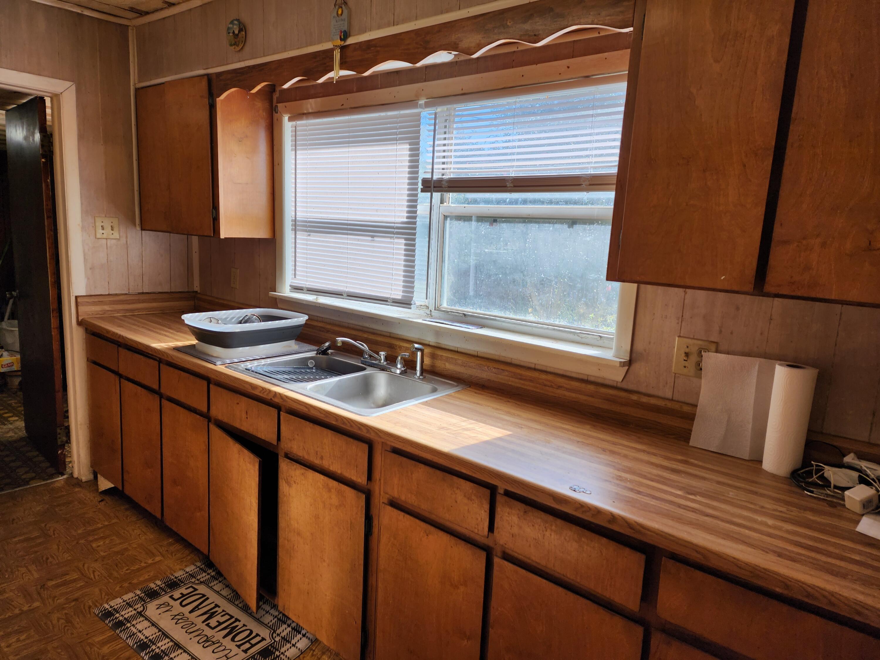6181 Bethany Drive Crestview, FL 32539 - Photo 13 of 28 a kitchen with sink and window