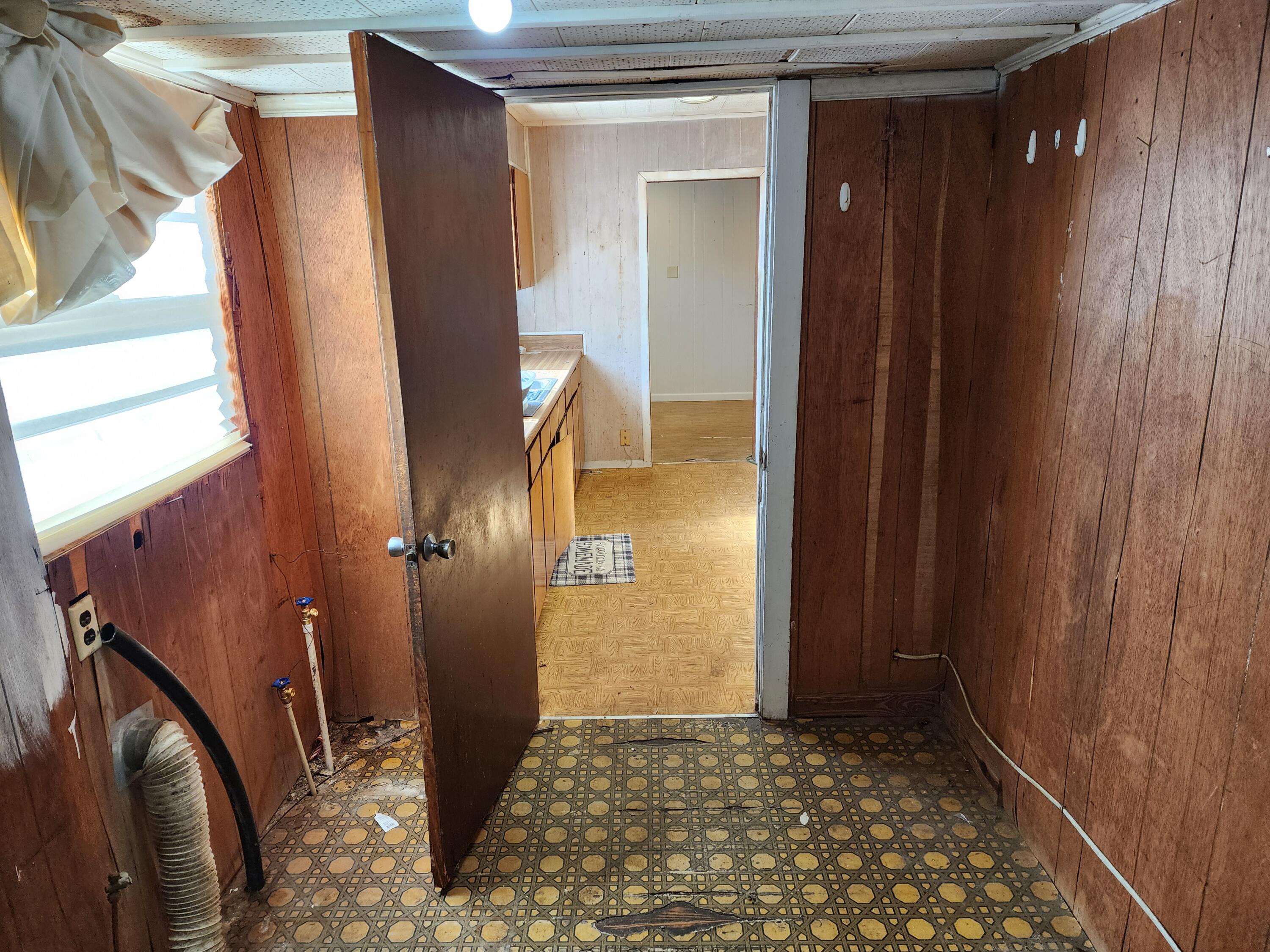 6181 Bethany Drive Crestview, FL 32539 - Photo 17 of 28 a view of entryway with a bathroom