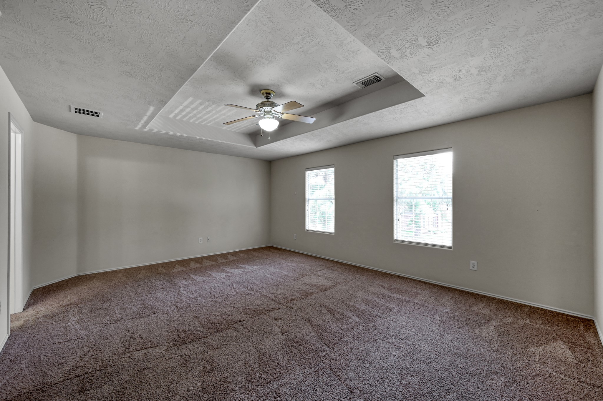 23919 Kingbriar Drive Spring, TX 77373 - Photo 23 of 33 The spacious primary suite offers a peaceful retreat with abundant natural light and room for oversized furnishings.