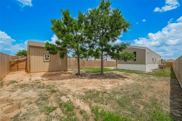 a house with trees in front of it