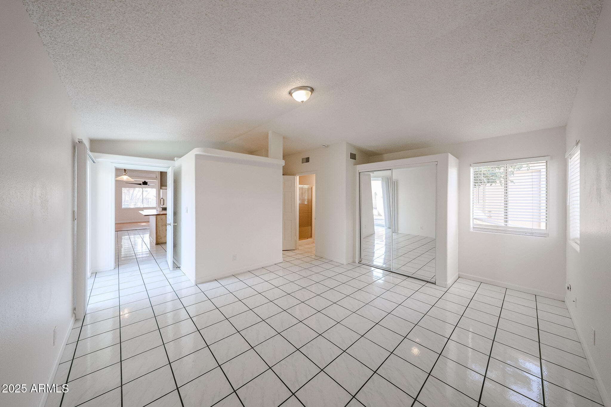 3408 West Port Au Prince Lane Phoenix, AZ 85053 - Photo 33 of 61 a view of an empty room and window