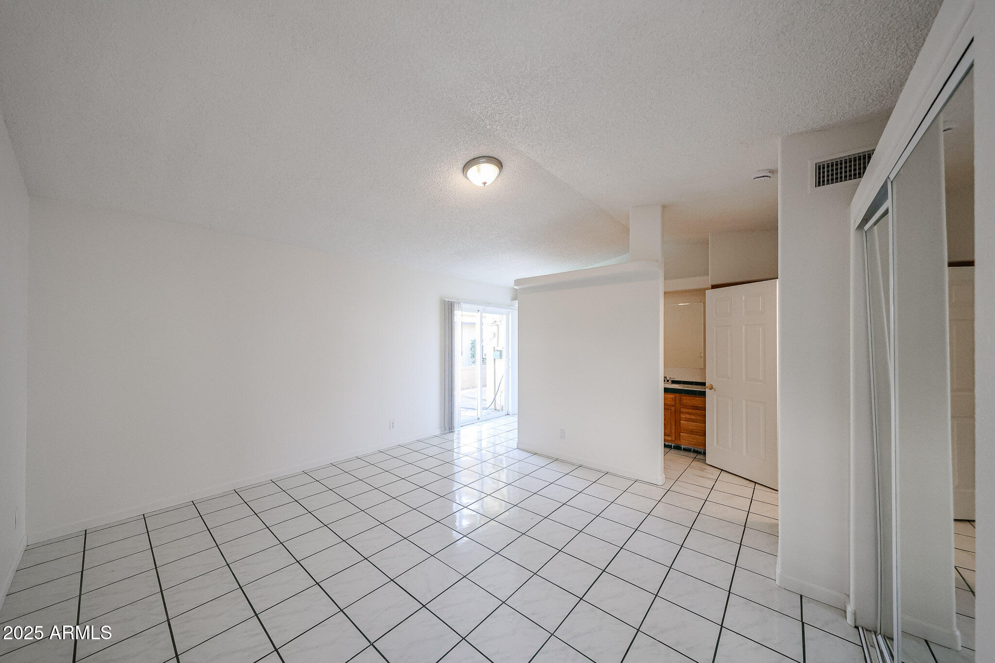 3408 West Port Au Prince Lane Phoenix, AZ 85053 - Photo 34 of 61 a view of an empty room and window