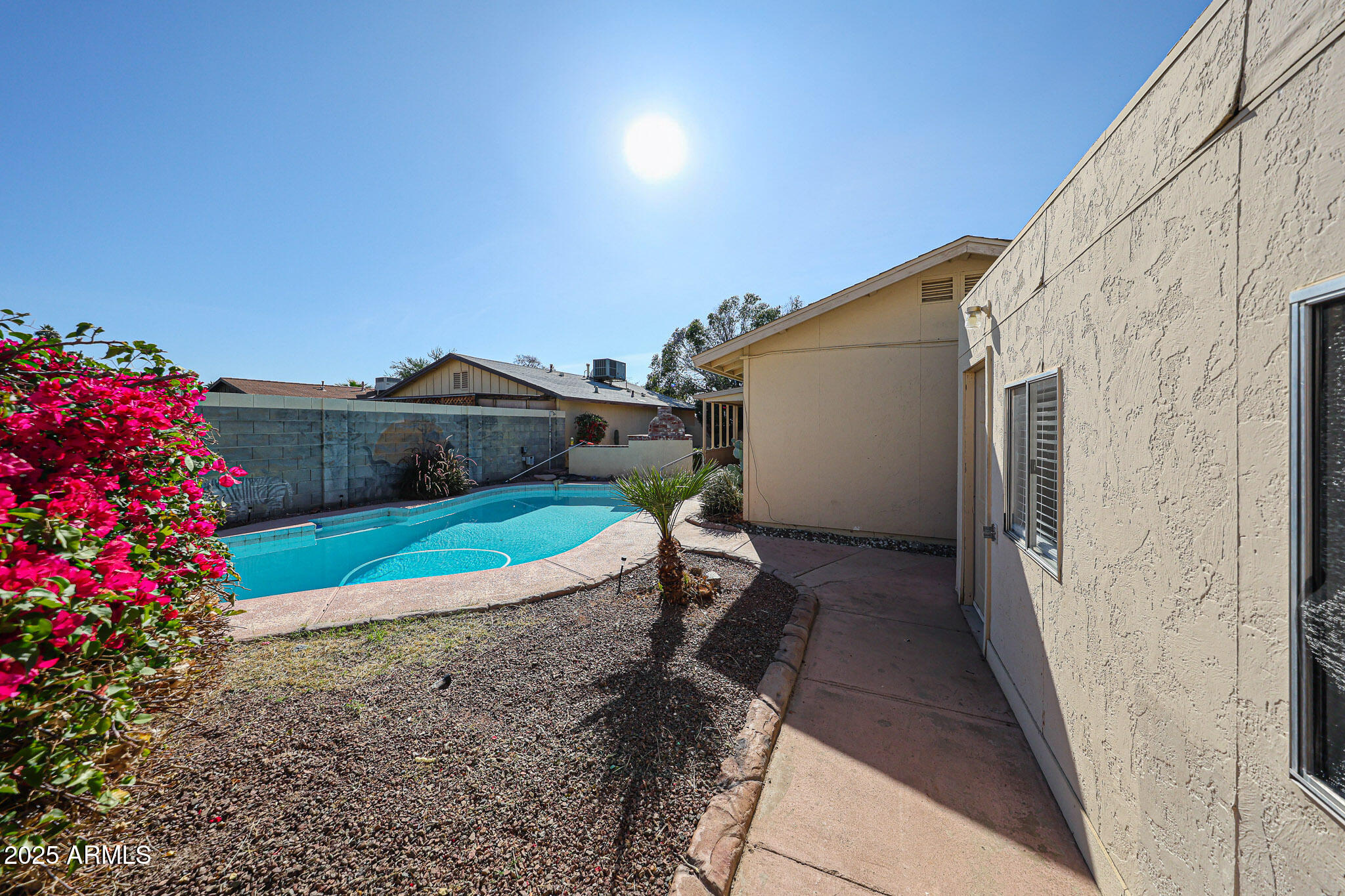 3408 West Port Au Prince Lane Phoenix, AZ 85053 - Photo 55 of 61 a view of a chair and table in the patio