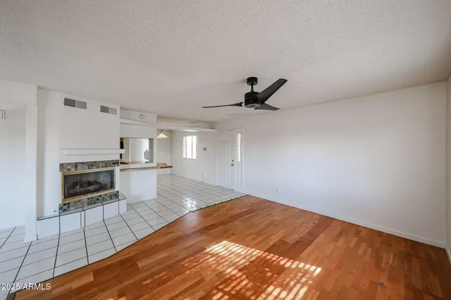 a view of an empty room and window
