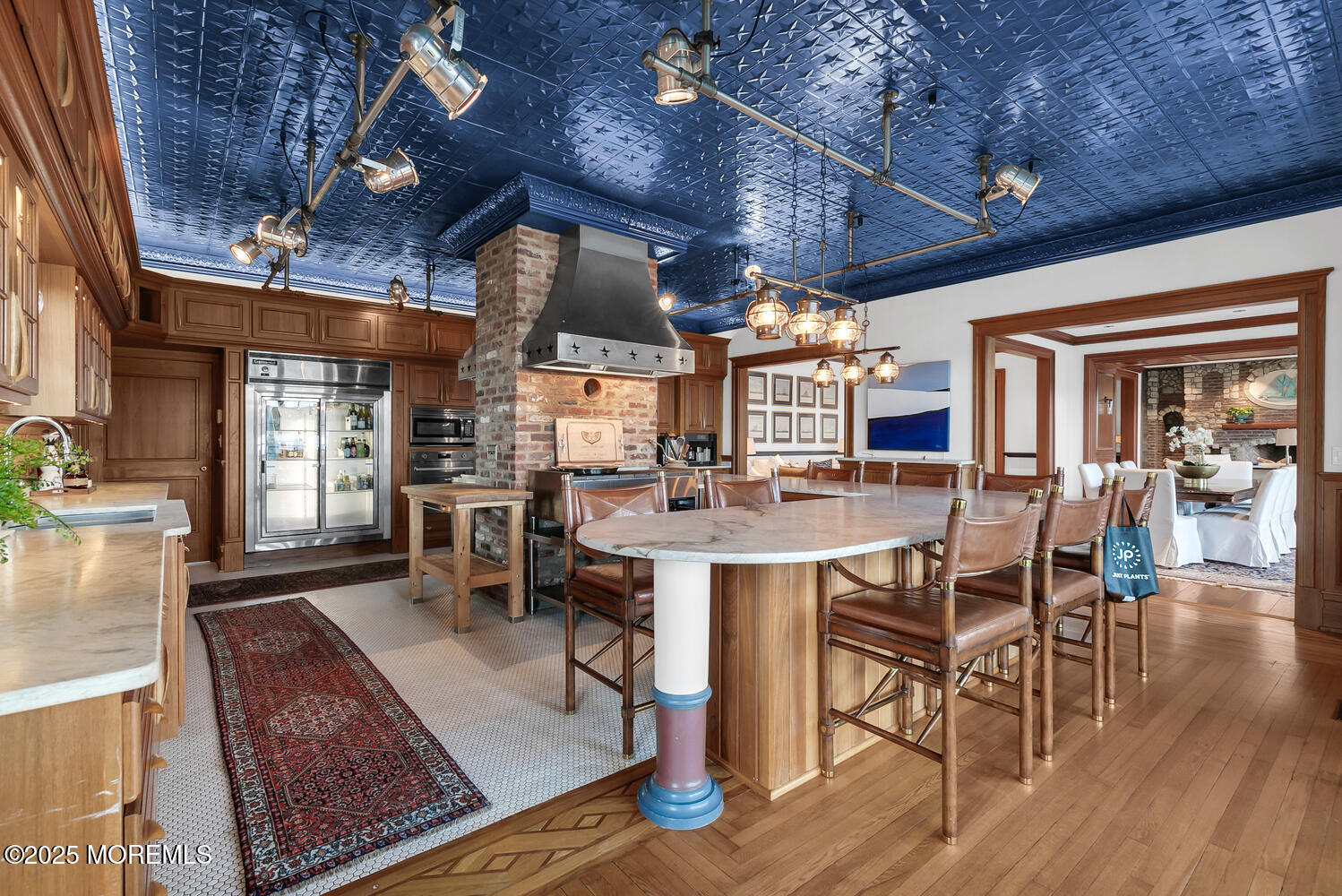 1 2nd Street Rumson, NJ 07760 - Photo 12 of 39 a view of a dining room with furniture wooden floor and chandelier
