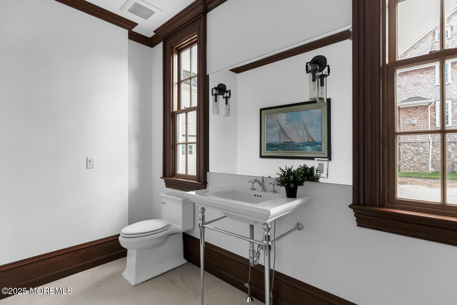 1 2nd Street Rumson, NJ 07760 - Photo 14 of 39 a bathroom with a sink toilet and mirror