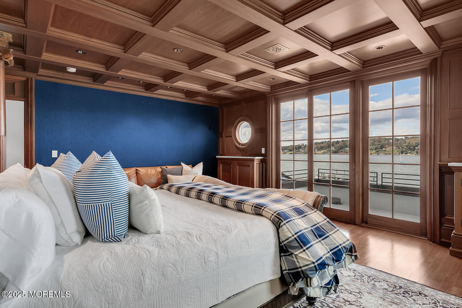 1 2nd Street Rumson, NJ 07760 - Photo 15 of 39 a bedroom with a large bed and a large window