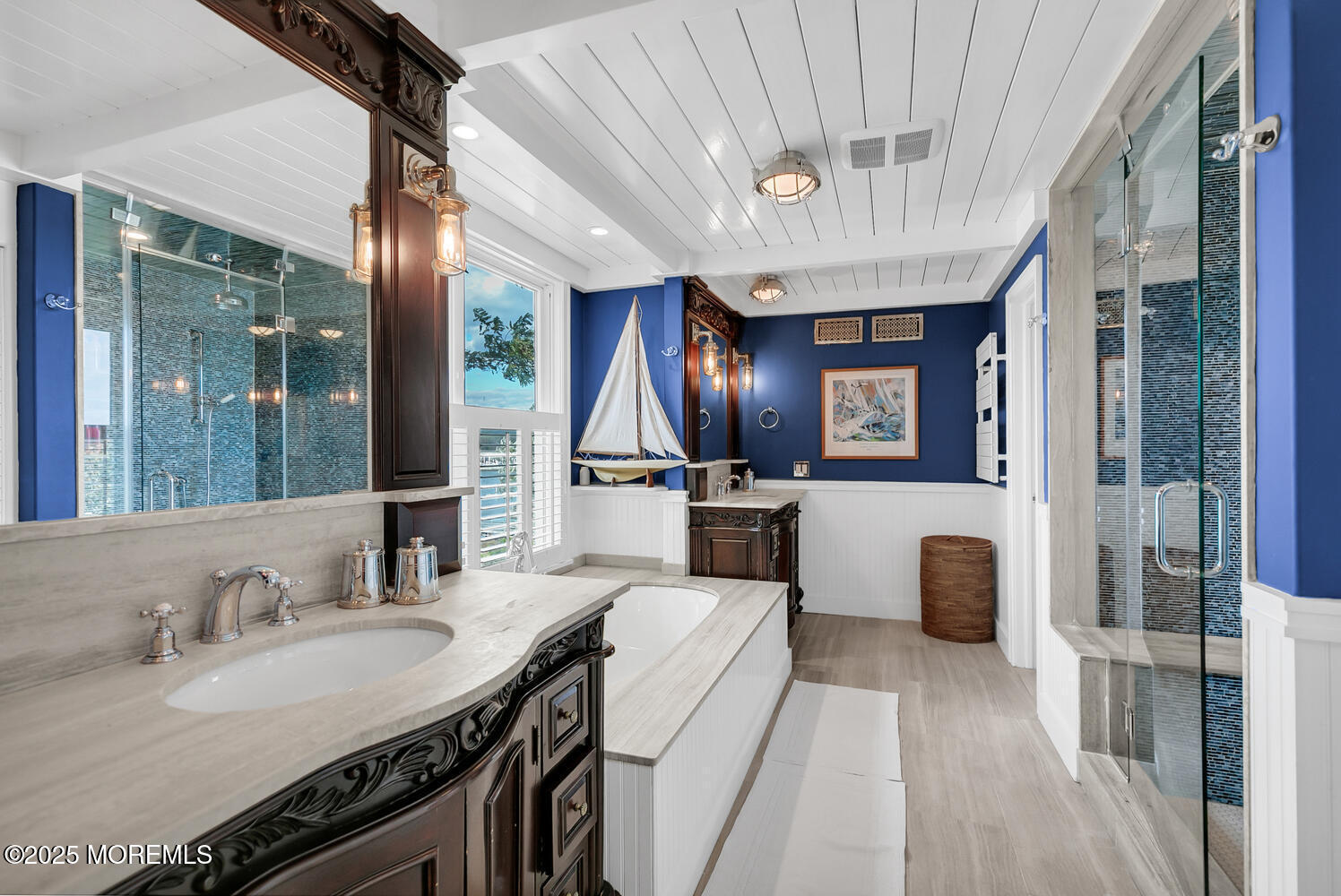 1 2nd Street Rumson, NJ 07760 - Photo 16 of 39 a spacious bathroom with a sink double vanity and a mirror