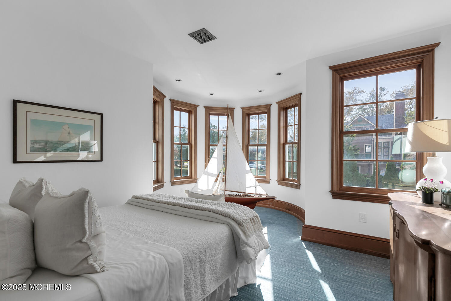1 2nd Street Rumson, NJ 07760 - Photo 19 of 39 a spacious bedroom with a bed and a large window