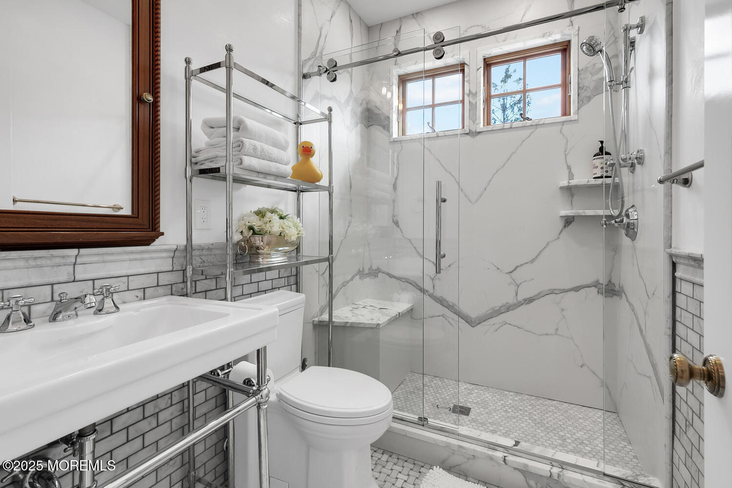 1 2nd Street Rumson, NJ 07760 - Photo 20 of 39 a bathroom with a sink toilet and shower