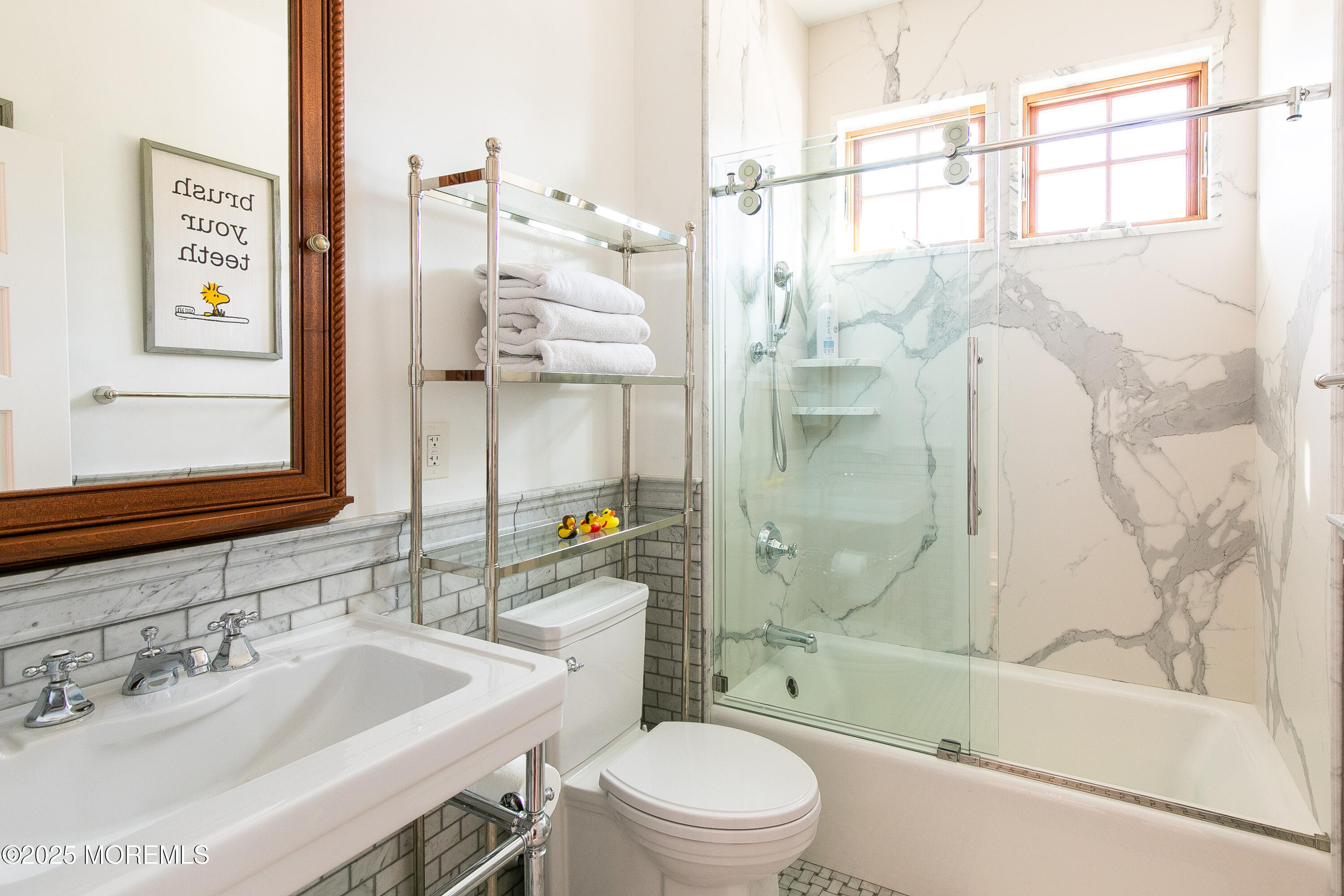 1 2nd Street Rumson, NJ 07760 - Photo 22 of 39 a bathroom with a sink toilet and shower