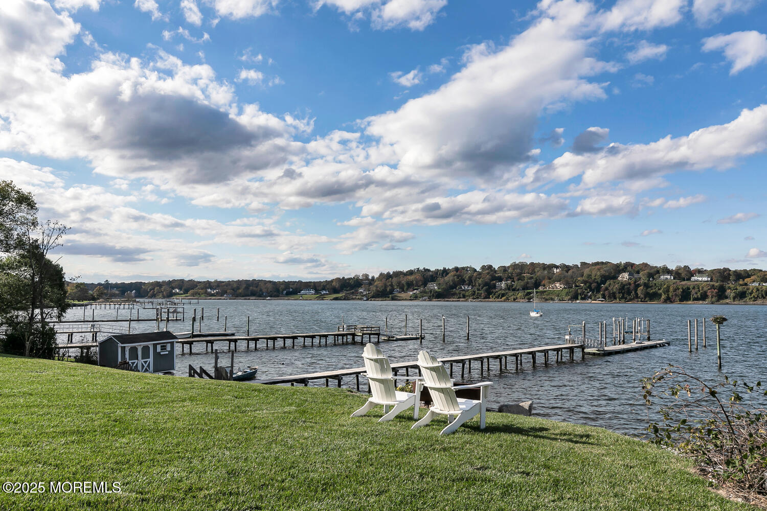 1 2nd Street Rumson, NJ 07760 - Photo 3 of 39 a view of a lake with houses in back