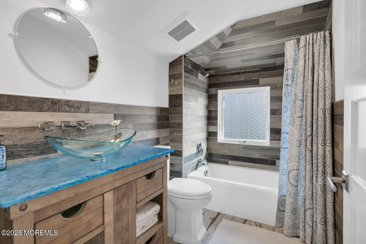 1 2nd Street Rumson, NJ 07760 - Photo 30 of 39 a bathroom with a granite countertop sink mirror vanity and toilet