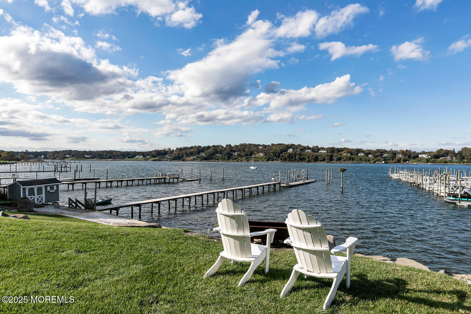 1 2nd Street Rumson, NJ 07760 - Photo 38 of 39 a view of a lake with furniture