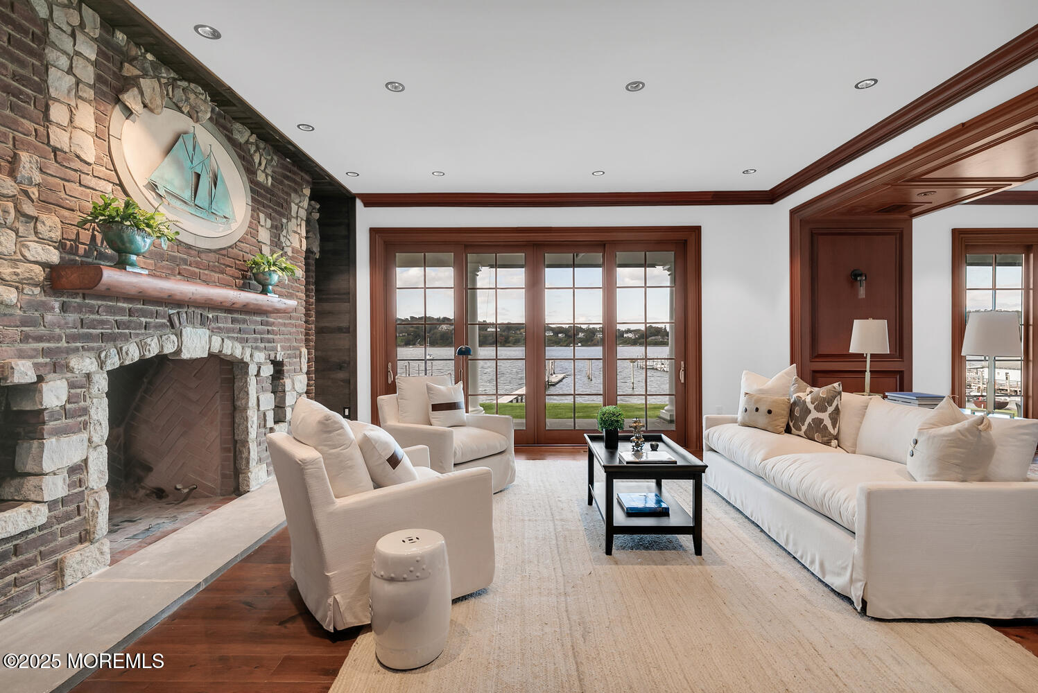 1 2nd Street Rumson, NJ 07760 - Photo 8 of 39 a living room with furniture and a fireplace