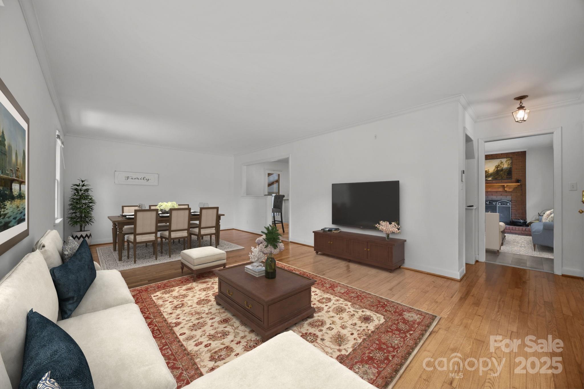 241 Stonewall Road Salisbury, NC 28144 - Photo 20 of 48 a living room with furniture and wooden floor