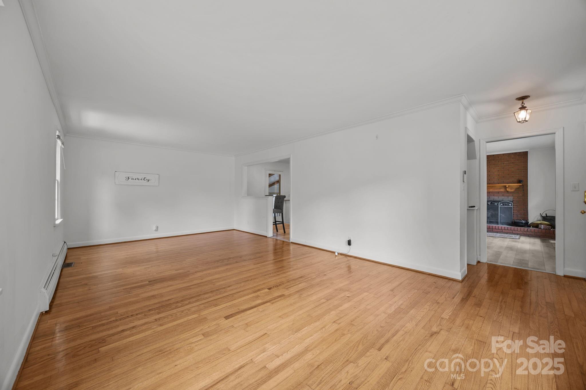 241 Stonewall Road Salisbury, NC 28144 - Photo 21 of 48 a view of empty room with wooden floor