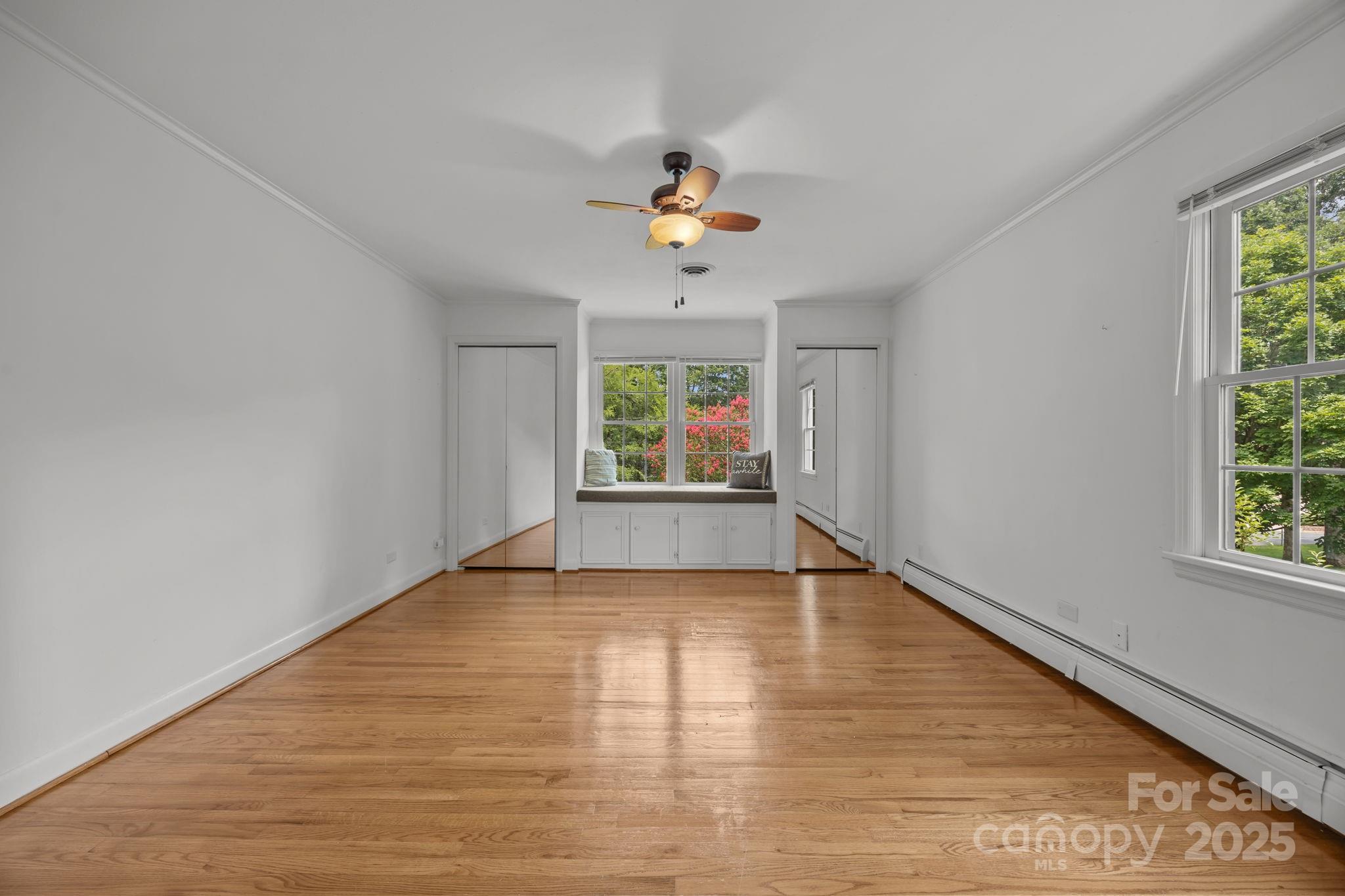 241 Stonewall Road Salisbury, NC 28144 - Photo 29 of 48 a view of an empty room with window and wooden floor